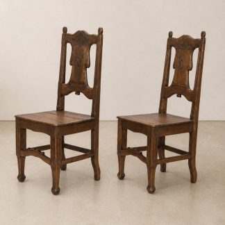 A pair of medieval oak chairs